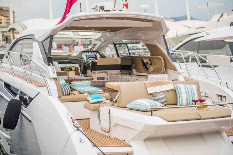 inside-luxury-sport-yacht-salone-nautico-genova-italy-display-big-modern-luxury-white-yacht-interior-commercial-101574648